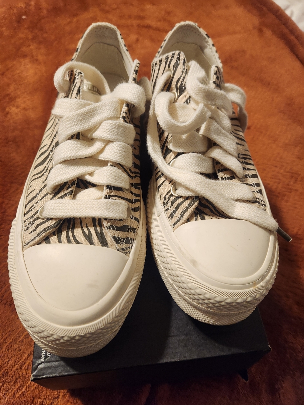Converse Zebra Print Low Top Sneakers in White and Black